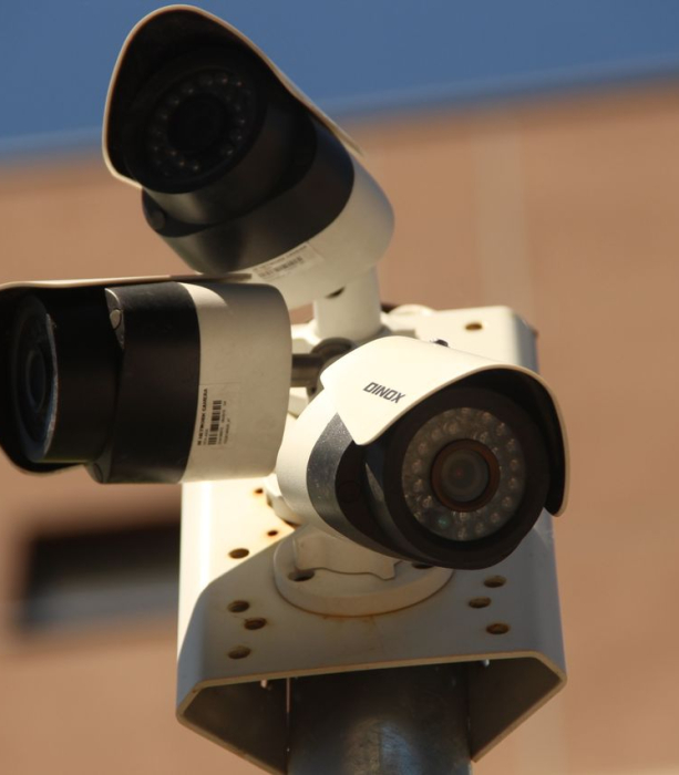 High-resolution surveillance cameras installed in a city environment for security purposes.